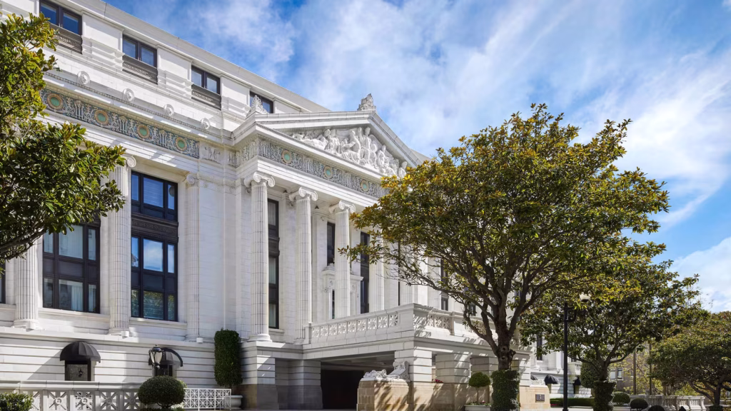 best indoor wedding venues in california Lavish ballroom at The Ritz-Carlton, San Francisco with crystal chandeliers and elegant wedding setup.