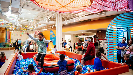 Cayton Children’s Museum 1st Birthday Party - Lombardi House Children playing in the interactive play zone at the Cayton Children’s Museum in Santa Monica during a 1st birthday celebration.