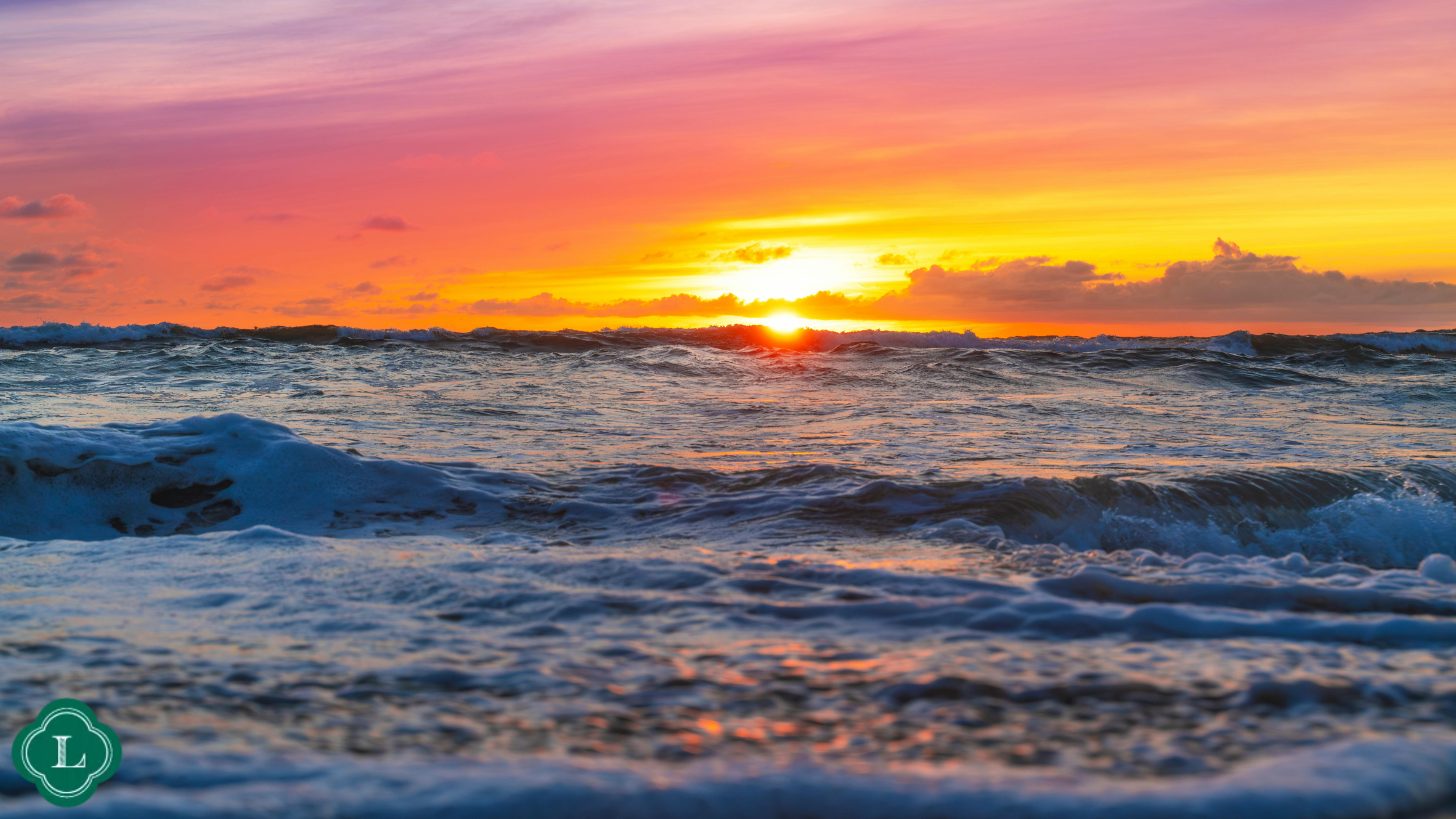 Lombardi new desing 2 - Lombardi House Sunset over the ocean with orange, pink, and purple sky and rolling waves